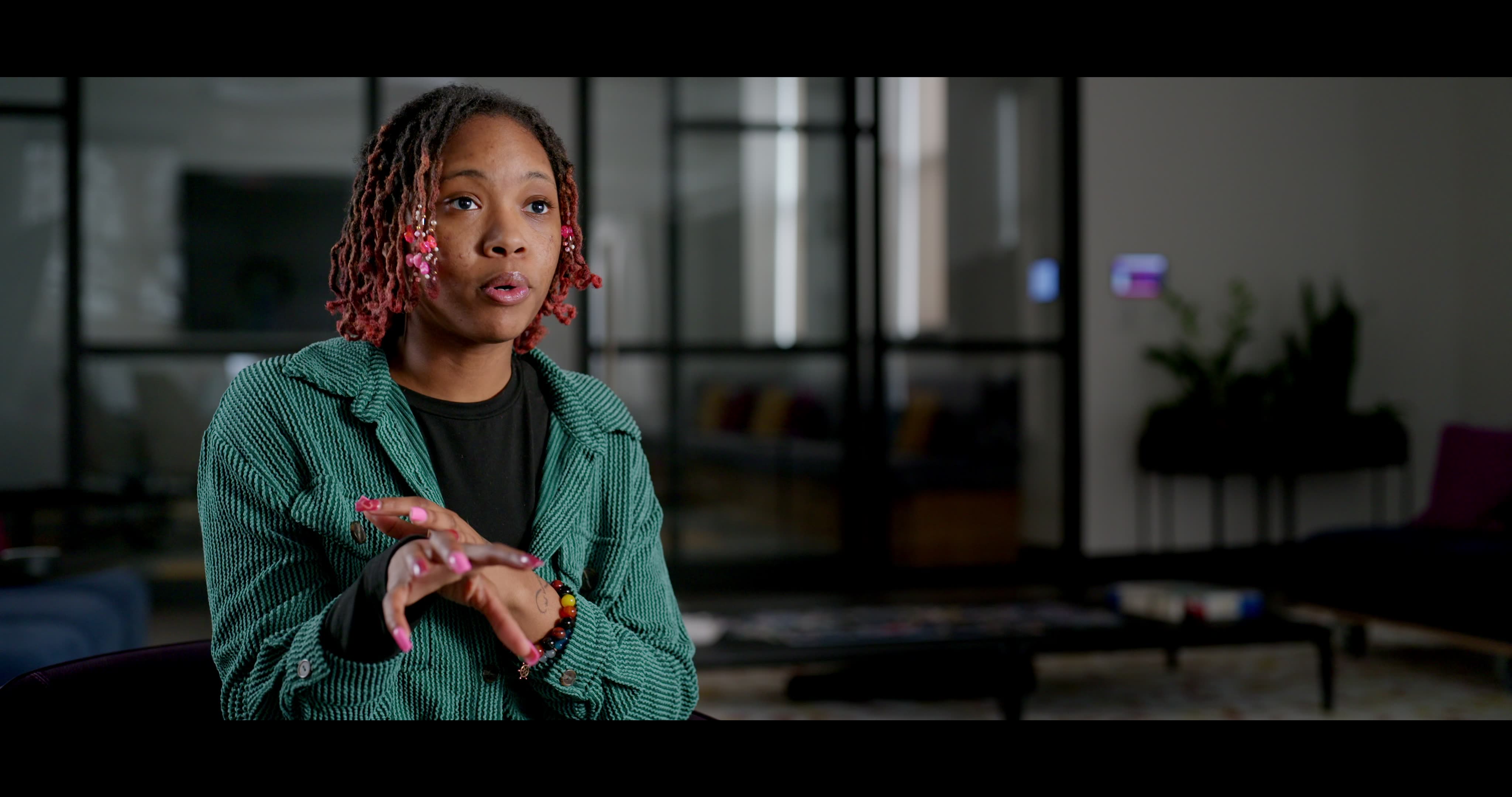 A young community member speaking